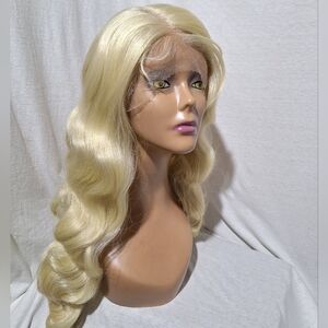 Blonde Wavy Human Hair Lace Front Wig. 26 Inches